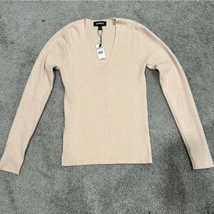 Cream beige Express sweater, new with tags. Size small